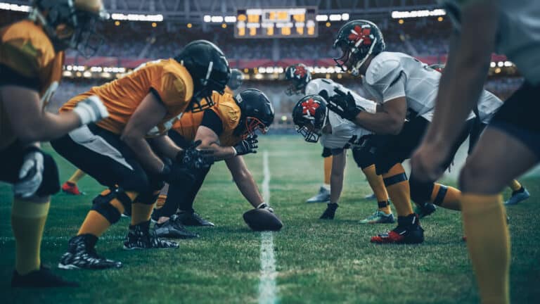 American Football Championship. Teams Ready: Professional Players, Aggressive Face-off, Ready for Pushing, Tackling. Competition Full of Brutal Energy, Power